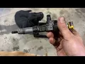 Changing injectors on Cat skid loader
