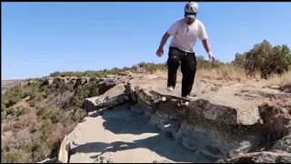 guy skateboards off a cliff