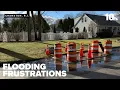 Cranston neighbors blame sinkhole as basements flood city disputes link