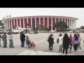 Suga fans wait outside Kia Forum ahead of Inglewood concert