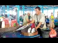 Download Lagu Uncle Angga's Amazing Skills Cutting Fresh Tola fish with Super Sharp Machete for Food Stalls