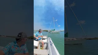 Rescuing a grounded boat! #sailboat #rescue #travel