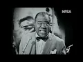 Louis Armstrong performs his chart-topping version of 'Mack the Knife', November 1964.