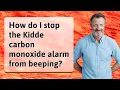 How do I stop the Kidde carbon monoxide alarm from beeping