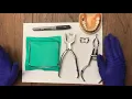 Punching the rubber dam for an anterior tooth