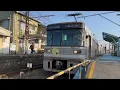 A Kumamoto Electric Railway train is coming.