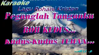 Download PEGANGLAH TANGANKU ROH KUDUS_KUDUS KUDUS TUHAN_KARAOKE_Nada Wanita MP3