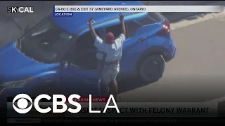 An alleged felony warrant suspect is taken into custody following a CHP pursuit