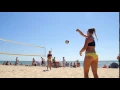 Female Beach Volleyball Paired Teams of Girls Playing Volleyball on the Beach