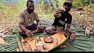 Fishing And Grilling Fish In The Forests Of South Papua
