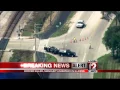 Police in Illinois hunt for 3 suspects after officer killed