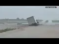 shows cars stranded in Lubbock flash flooding
