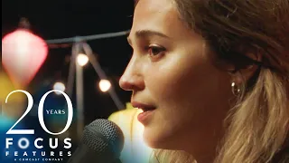 blue bayou alicia vikander sings at a dinner party