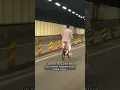 Download Lagu Man rides e-bike through Sydney's Eastern Distributor without a helmet