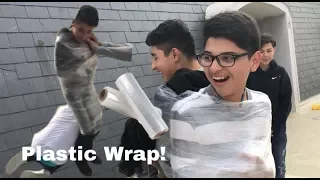 Download Wrapping people in plastic wrap! MP3