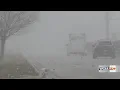 Snow squall causes power outages school closings in Central IL