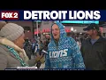Lions fans tailgate in the bitter cold before Cowboys game
