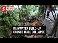 Accumulation of rainwater behind retaining wall led to Taman United collapse