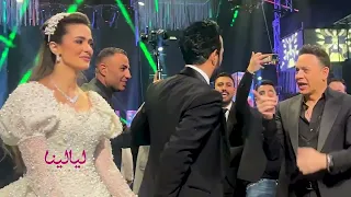 وسط ضحكاتهم  تامر حسني  يقلد  صوت مصطفى قمر في حضوره في زفاف أحمد عصام دندنها