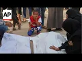 Download Lagu Relatives mourn as children among dead in Israel strikes in Gaza
