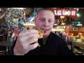 Jason eats a Hellfire Slider at Roosters