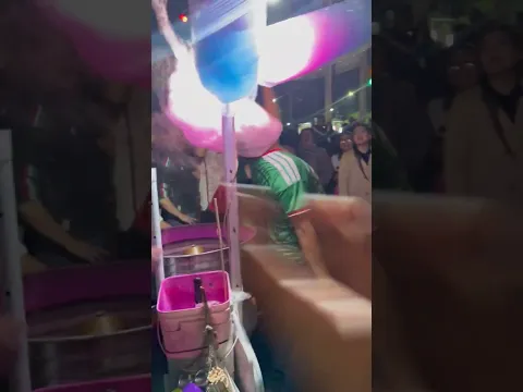 Man Spins and Wraps His Head in Cotton Candy