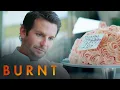 Tony Demands a Birt ay Cake Burnt Bradley Cooper Emma Thompson Daniel Bruhl
