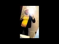 Crossdresser posing in front of a mirror