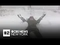 John Elliott makes a snow angel