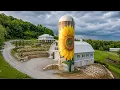 Massive Barn Build Towering Sunflower Silo Mural by kbuild