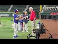 Texas Rangers Principal owner Ray Davis talks with Hitting coach Bret Boone 25