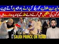 Saudi Prince Al-Waleed Bin Talal Giving Cars and Helping Needy People While Cycling - Arab Urdu News