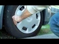 Replacing the Hubcap on a Nissan Versa