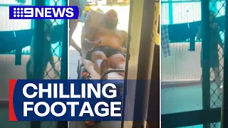 New footage of a stabbing victim desperately seeking refuge 9 News Australia