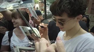 Timothee Chalamet signs autographs for TopPix