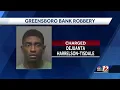 Suspect accused of robbing Truist bank under arrest police say