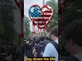 UNC Chapel Hill students surround the American flag to protect it from being removed by protesters