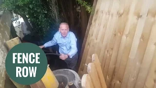 Angry millionaire caught tearing down neighbour s fence