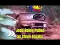 Complete of Jeep Being Pulled as Chain Breaks Chain Breaks Pulling Jeep