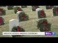 Volunteers honor veterans with wreaths at Texas State Veterans Cemetery in Abilene