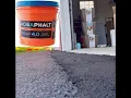 Using Aquaphalt to build a transition ramp from sinking asphalt driveway lip