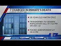 7 charged in inmate s death