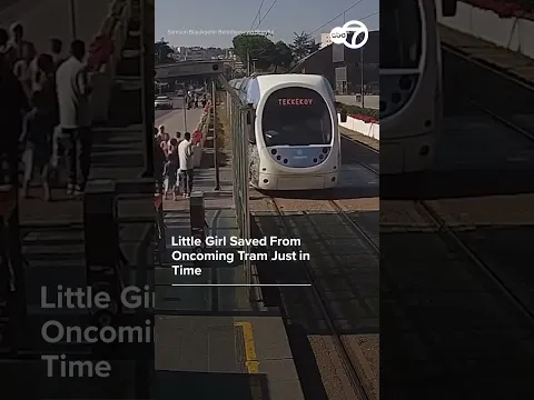 Little girl saved from oncoming tram just in time