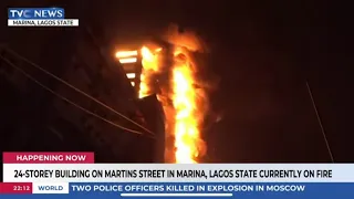 live fire razes 22 storey building in lagos tvc crew traders scamper for safety 