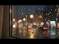 Rain falling against window pane 20260924173737