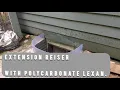 Extension risers and window well cover with locks