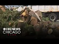 Aurora Illinois races to clean up ahead of new storms