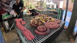 Big Meat, Beef and Sausage Grill from Argentina. Street Food seen in Italy