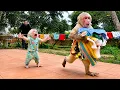 Baby Monkey Bibi Help Mom Collect Laundry On Drying Rack