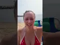 Routines Woman no bra with bikini in the beache my big nipples